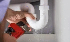 How can installing a simple hose tap near balconies or utility areas make cleaning easier