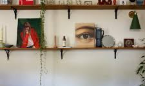 How can rotating photos or artwork in frames seasonally keep your home feeling updated without buying new pieces