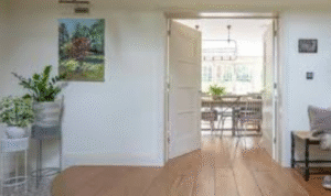 How can thinking about where water is likely to drip influence which flooring you pick for entry areas