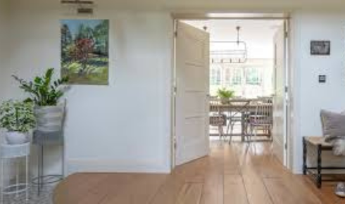 How can thinking about where water is likely to drip influence which flooring you pick for entry areas