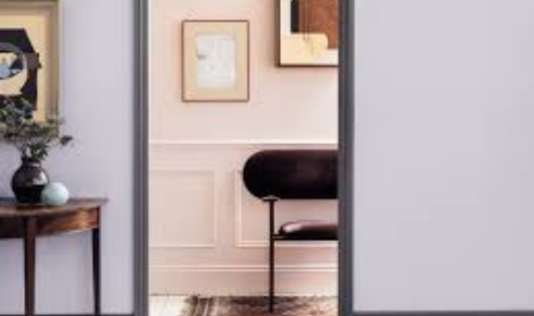 How can using protective mats under desk chairs prevent damage to certain types of flooring