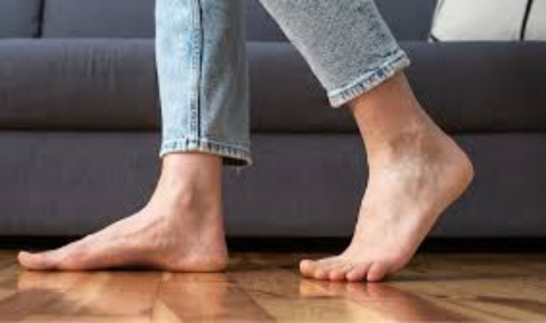 How can walking across different sample floors in bare feet and socks reveal real comfort levels