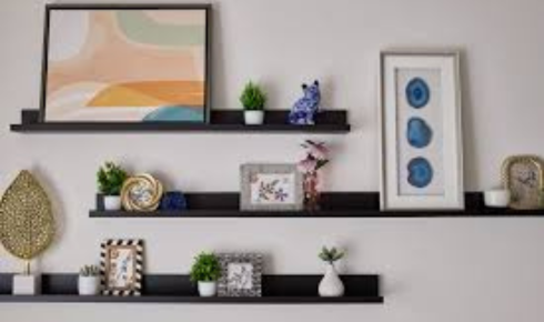 Why does leaving a little floor space visible around big furniture pieces make rooms feel less cramped